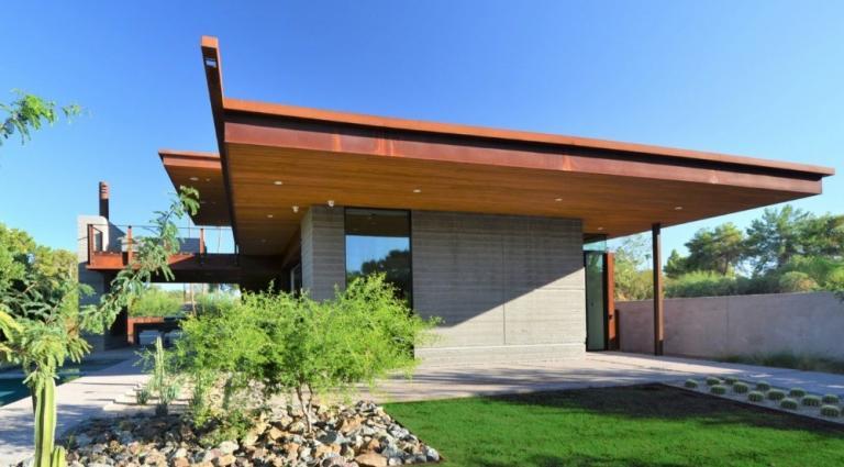 Pre-finished cedar wood ceilings and soffits add warmth to this modern ...